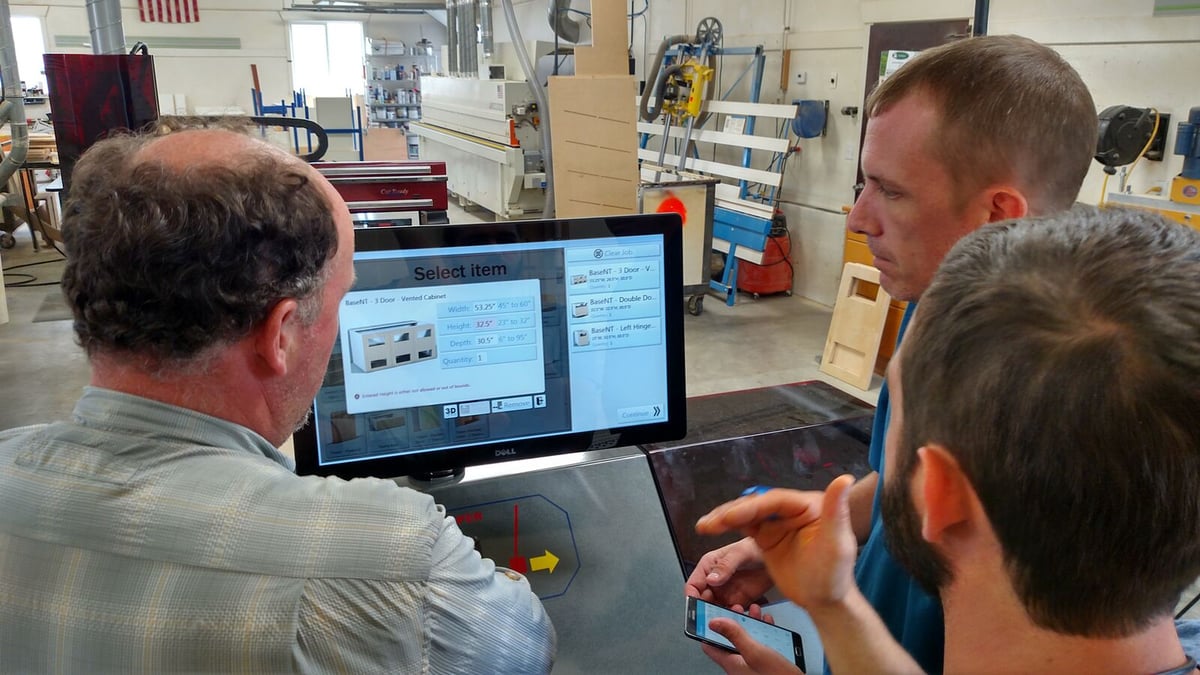 Employees at Original Woodworking Learning about their new Thermwood Cut Center